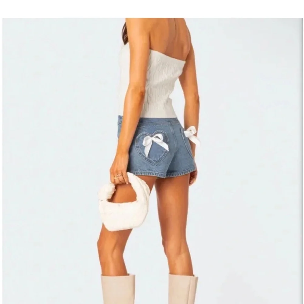 EDIKTED White Bow Pocket Jean Shorts, Size L - Picture 11 of 11
